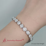 Load and play video in Gallery viewer, Diamond Bezel Set Tennis Bracelet 12 Carat