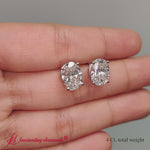 Load and play video in Gallery viewer, basket-prong-stud-earring-oval-shaped-4-carat-in-white-gold-FDEAR-10411OVAN