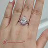Load and play video in Gallery viewer, bezel-set-pear-crown-blue-topaz-engagement-ring-in-14k-white-gold-fd1046per