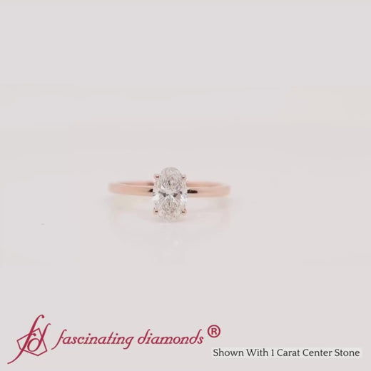 oval-shaped-thin-classic-solitaire-engagement-ring-in-rose-gold-fdens9358ov