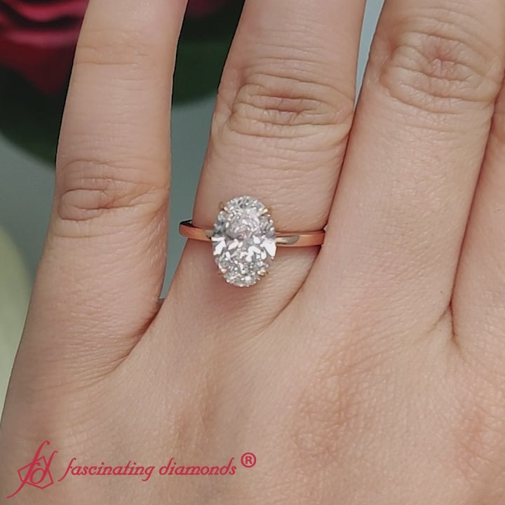 Oval-diamond-ring-with-hidden-halo-in-rose-gold-FD11489R-720