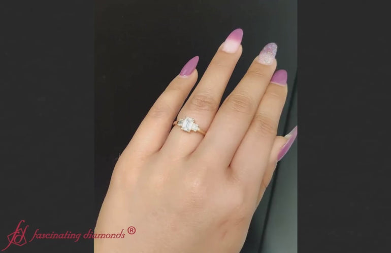 delicate-three-stone-emerald-cut-diamond-ring-in-yellow-gold-FD9299EMR-fancyvideo