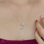 Load and play video in Gallery viewer, double-circle-diamond-necklace-in-yellow-gold-fdpd10835-fancyvideo