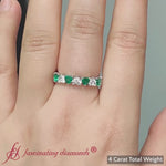 Load and play video in Gallery viewer, 4-carat-heart-eternity-diamond-anniversary-band-with-emerald-in-white-gold-FDEWB8439
