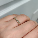 Load and play video in Gallery viewer, Oval-bezel-set-spaced-eternity-diamond-band-in-14k-yellow-gold-FD10979OV-720x720