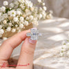 Emerald-accent-luxury-emerald-cut-diamond-ring-in-white-gold-720-1
