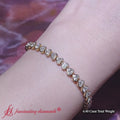 Thumbnail 1 - 4-40-ct-heart-shaped-diamond-bezel-tennis-bracelet-in-yellow-gold-fdbrc10581ht-720 x 720