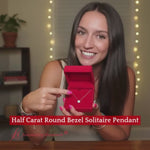 Load and play video in Gallery viewer, round-bezel-solitaire-half-carat-pendant-in-white-gold-fdpd10538ro-0-50-ct-model1-640
