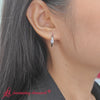 Bezel-emerald-diamond-huggie-hoop-earrings-in-white-gold-720 x 720 - FDEAR11743_Fancy