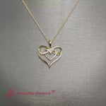 Load and play video in Gallery viewer, infinity-heart-pendant-in-14k-yellow-gold-fdpd11553

