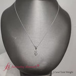 Load and play video in Gallery viewer, 1-carat-marquise-solitaire-pendant-in-white-gold-FDPD8469