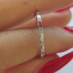 Load and play video in Gallery viewer, thin-space-out-stackable-diamond-band-with-blue-topaz-in-white-gold-FDEWB9437
