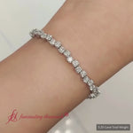 Load and play video in Gallery viewer, zig-zag-tennis-diamond-bracelet-in-white-gold-fdbrc10410-640
