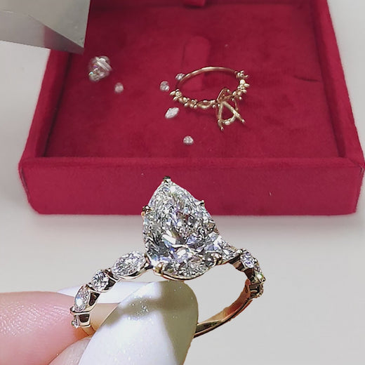 pear-shaped-lab-diamond-ring-with-floating-marquise-stones-yellow-gold-FDENS9398R1