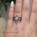 Load and play video in Gallery viewer, Twisted Pear Halo Bridal Ring Set

