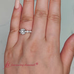 Load and play video in Gallery viewer, Oval Accented Round Cut Engagement Ring
