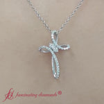 Load and play video in Gallery viewer, Twisted Cross Diamond Pendant
