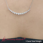 Load and play video in Gallery viewer, 1-carat-round-graduated-diamond-necklace-in-white-gold-fdnk8056-1-ct-fancyvideo