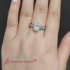 Load and play video in Gallery viewer, oval-shaped-antique-filigree-diamond-ring-with-ice-blue-topaz-in-14K-white-gold-FDENS3543OVR