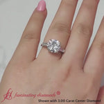 Load and play video in Gallery viewer, round-cut-bar-baguette-3-stone-diamond-engagement-ring-in-white-gold-FDENS100