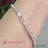 Load and play video in Gallery viewer, emerald-cut-horizontal-tennis-bracelet-in-white-gold-fdbrc10220em-10-00-ct-2000