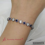 Load and play video in Gallery viewer, heart-shaped-lab-diamond-bezel-tennis-bracelet-7-75-carat-in-18k-white-gold-fdbrc10581ht-7-75-ct-2000
