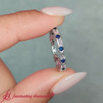 Load and play video in Gallery viewer, baguette-and-round-diamond-band-with-blue-sapphire-in-white-gold-fdewb318gs
