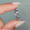 baguette-and-round-diamond-band-with-blue-sapphire-in-white-gold-fdewb318gs