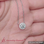 Load and play video in Gallery viewer, half-carat-halo-diamond-pendant-in-white-gold-fdpd10984-0.50-ct-video
