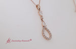 Load and play video in Gallery viewer, teardrop-diamond-drop-pendant-necklace-in-rose-gold-fdpd9049-video
