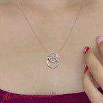 Load and play video in Gallery viewer, double-circle-diamond-necklace-in-rose-gold-fdpd10835-fancyvideo