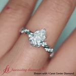 Load and play video in Gallery viewer, pear-shaped-twisted-vine-engagement-ring-in-white-gold-FD9127PER
