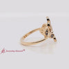Load and play video in Gallery viewer, swirl-leaf-promise-diamond-ring-with-sapphire-in-yellow-gold-fd8342