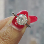 Load and play video in Gallery viewer, classicsixprongroundsolitairemoissaniteengagementringin18kblackgold-FD9334ROR
