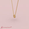 Load and play video in Gallery viewer, half-carat-halo-diamond-pendant-in-yellow-gold-fdpd10984-0.50-ct