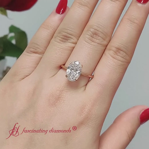 solitaire-knife-edge-oval-shaped-diamond-engagement-ring-in-rose-gold-FD9239OV