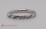Load and play video in Gallery viewer, twisted-vine-diamond-wedding-band-with-blue-topaz-in-platinum-fd9127b
