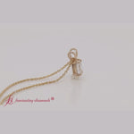 Load and play video in Gallery viewer, emerald-cut-diamond-solitaire-pendant-in-yellow-gold-fdpd8469em-720
