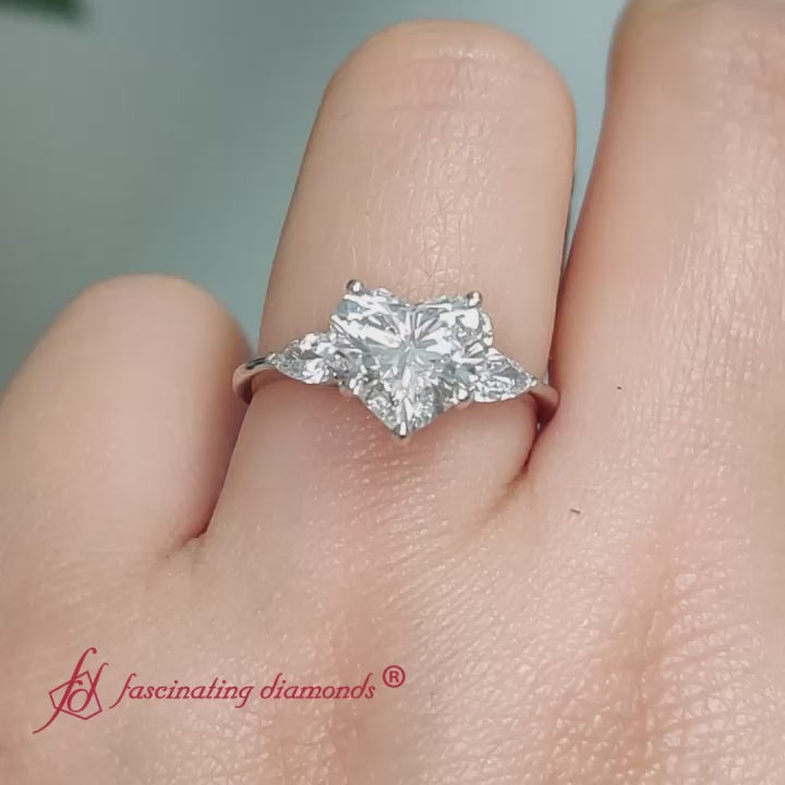heart-shaped-pear-3-stone-cathedral-engagement-ring-in-14k-white-gold-fdenr9210-720x720(2)

