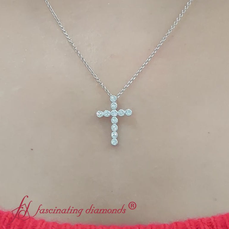 Name
milgrain-bezel-diamond-cross-pendant-in-white-gold-fdpd10799