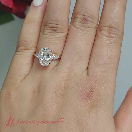 Pear-diamond-cathedral-oval-shaped-engagement-ring-in-14k-yellow-gold-fdenr9210ovr720x720-new


