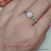 Load and play video in Gallery viewer, french-pave-round-petite-emerald-engagement-ring-in-white-gold-FD9918