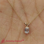 Load and play video in Gallery viewer, Emerald Cut 4 Prong Solitaire Pendant
