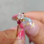 Load and play video in Gallery viewer, pear-diamond-cathedral-round-cut-engagement-ring-with-ruby-in-yellow-gold-fd-enr9210

