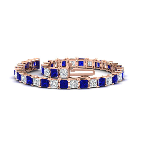 princess-cut-15-carat-sapphire-basket-tennis-bracelet-in-rose-gold-FDBRC10450PRGSABLANGLE4-15.00CT-NL-RG_3313ecec-8b22-402e-9cf5-8b9ec4f25fc2