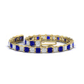 Thumbnail 48 - princess-cut-15-carat-sapphire-basket-tennis-bracelet-in-yellow-gold-FDBRC10450PRGSABLANGLE4-15.00CT-NL-YG_336d93cb-2bb4-4095-9e8e-be706846658f
