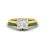 Load image into Gallery viewer, princess-cut-bezel-solitaire-ring-with-emerald-band-in-yellow-gold-FD11229PRGEMGR-NL-YG.jpg?v=1758702874
