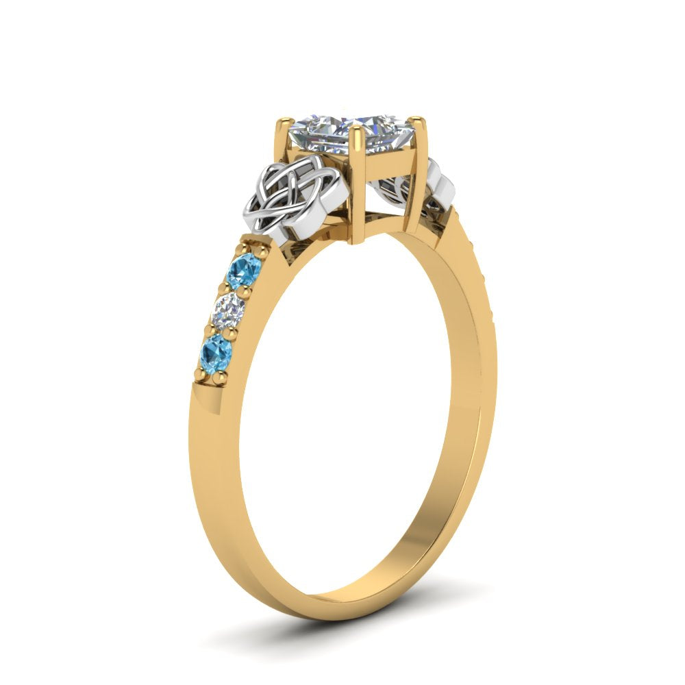 princess-cut-celtic-diamond-ring-with-blue-topaz-in-14K-yellow-gold-FDENS2255PRRGICBLTOANGLE2-NL-YG_304cfa9f-785a-48d9-ae20-f96c21d148c9