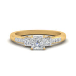 Load image into Gallery viewer, princess-cut-channel-three-stone-diamond-engagement-ring-in-yellow-gold-FDENS205PRR-NL-YG.jpg
