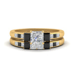 Load image into Gallery viewer, princess-cut-channel-three-stone-diamond-engagement-ring-with-black-diamond-in-yellow-gold-FDENS205PRGBLACK-NL-YG.jpg

